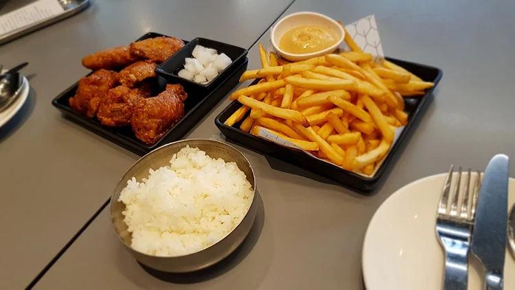 Bonchon Chicken thighs and French Fries